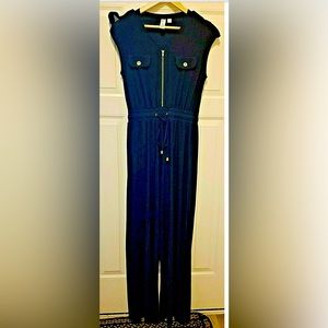 Emma & Michele Navy a romper with gold details